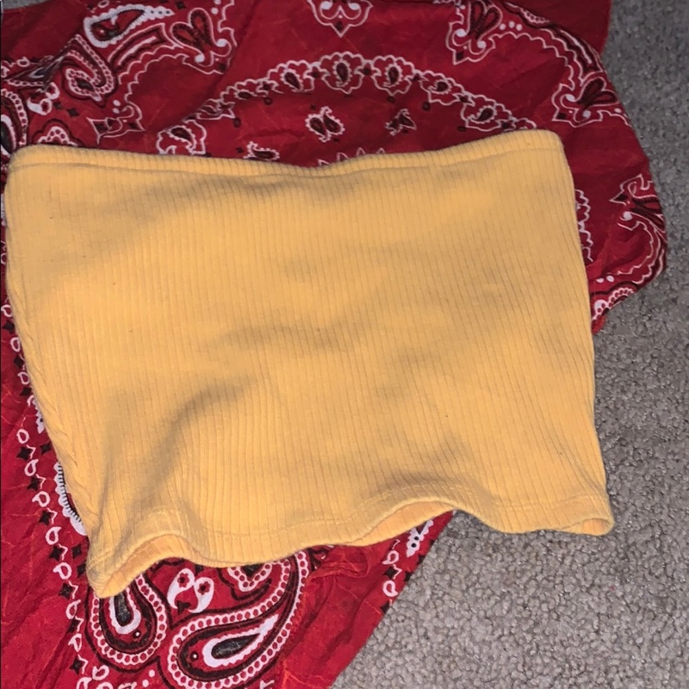 Pale yellow tube top or short short mini skirt